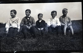 Five boys in a field