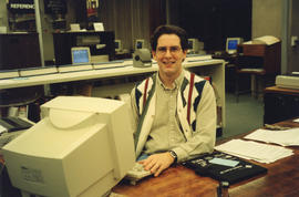 Photograph of James Boxall working at the Killam Memorial Library