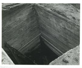 Photograph of the remains of a mine shaft at Molega
