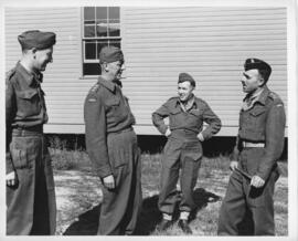Photograph of Richard Roome and three unidentified officers of the No. 7 Operational Training Uni...