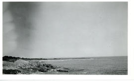Photograph of Flat Point, Louisbourg taken from the shore facing Kennington Cove