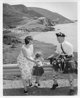 Photograph of Cape Breton piper and tourists