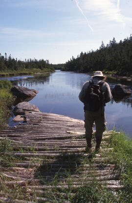 Photograph of Bill Freedman standing along the banks of Moose River, Eastern Shore, Nova Scotia