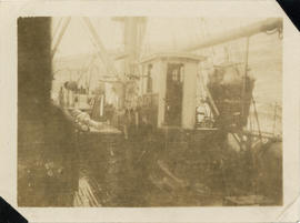 Photograph of a wave about to break over the forward deck of the cable-ship Mackay-Bennett