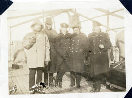 Photograph of crew members on the deck of the cable-ship Mackay-Bennett