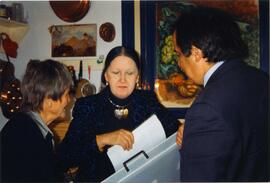 Photograph of Elisabeth Mann Borgese and two unidentified people