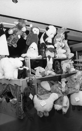Photograph of a stand selling stuffed animals at a craft market