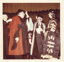 Photograph of Henry Hicks and Lady Beaverbook presenting an honorary degree