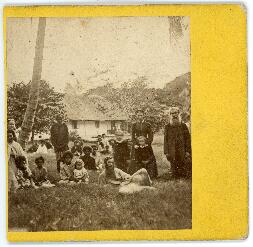 Photograph of Rev. J. G. Paton, his family, and several unidentified Indigenous people, at the mi...