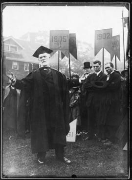 Photograph of Dr. John Forrest addressing a gathering at Dalhousie University's centenary celebra...
