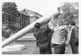 Photograph of the raising of the Flagpole at Studley Campus