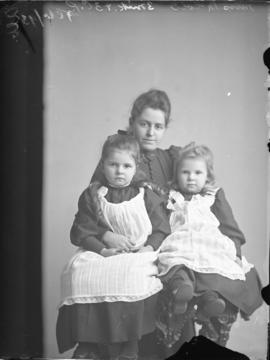 Photograph of Miss McColl and two children