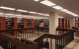 Photograph of the staircase and stacks in the Kellogg Library