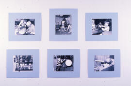 Photograph of children playing images on a display wall