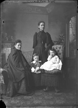 Photograph of Mrs. Meahan and unknown individuals