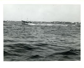 Photograph of two fishing boats racing off Cape Sable Island