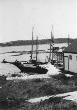 Photograph of Weldon Morash's salt store and fishing boat in West Dover, Nova Scotia