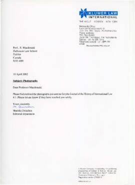 Correspondence between Ron Macdonald and Mariska Duindam, regarding inclusion of photographs in a...