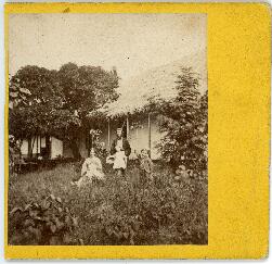 Photograph of Rev. J. Copeland and family at mission house in Futuna, New Hebrides
