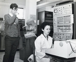 Photograph of people with an IBM computer in the Dalhousie Computer Centre