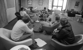 Photograph of students sitting in a lounge in the Dalhousie Arts Centre