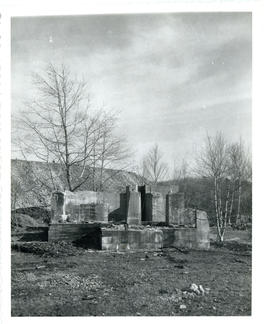Photograph of the remains of an ore-crusher at Molega