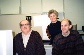 Photograph of Rob Robertson, Milada Rodriguez and Clement Tremblay in the Cataloguing Department