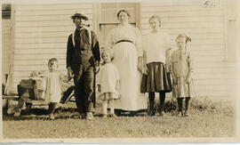 Photograph of Walter Blank and family at Station Number 3 at the east end of Lake Wallace on Sabl...