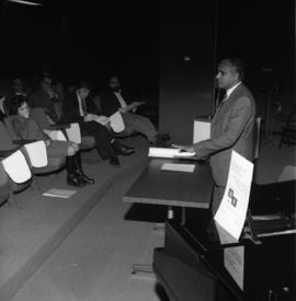 Photograph of an unidentified person giving a lecture at the Dalhousie Arts Centre