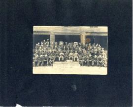 Scrapbook page with a portrait of T.H. Raddall, Sr. with the Canadian School Musketry in Ottawa, ...