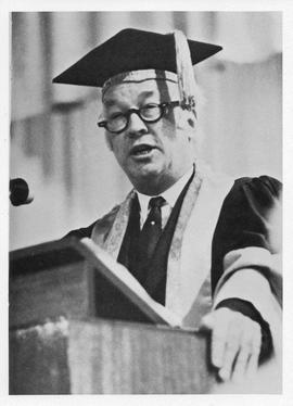 Photograph of Henry Hicks speaking at a podium