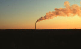 Photograph of a sunset over the Inco Superstack, Copper Cliff site, near Sudbury, Ontario