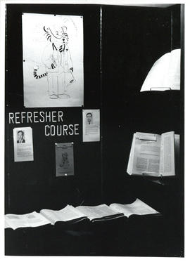 Photograph of display case exhibit on Refresher Course