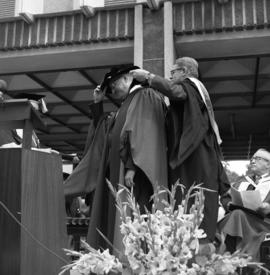Photograph of a degree being awarded at the Dalhousie medical centennial convocation ceremony