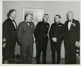 Photograph of Richard Roome, Admiral Rollo Mainguy, Major-General Edward Plow, and two other offi...