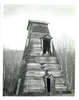 Photograph of the remains of a shaft house at one of the Molega gold mines