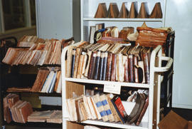 Photograph of a library cart of books damaged in the 1998 Killam Library fire