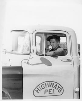 Photograph of an unidentified Island Highways employee