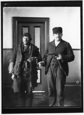 Photograph of two unidentified men in costumes