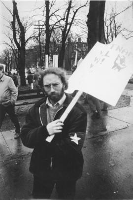 Photograph of Peter McGuigan during an anti-Vietnam War march near Victoria Park