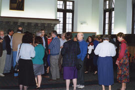 Photograph of guests mingling at Sylvia Fullerton's retirement party in University Hall