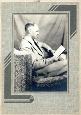Portrait of Thomas Head Raddall reading