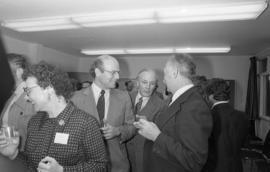 Photograph of people mingling at the opening of the Ocean Studies house