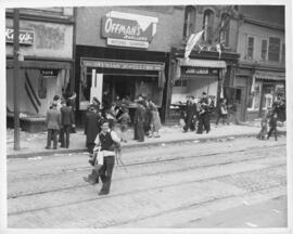 Photograph of looters and bystanders outside Offman's Jewellers on Barrington Street during the H...