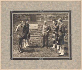 Photograph of Thomas Head Raddall with officers of the Cadet Corps and Headmaster Waddington at K...