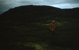 Photograph of McK. Porter walking outdoors in Cape Dorset, Northwest Territories