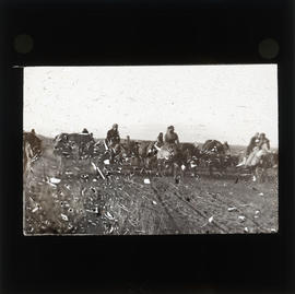 Photograph of people on horseback