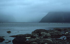 Photograph of a fjord and low-lying cloudcover at Gros Morne National Park, Newfoundland and Labr...