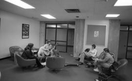 Photograph of students sitting in a lounge in the Dalhousie Arts Centre