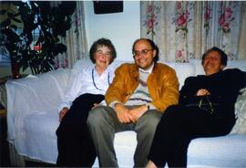 Photograph of Elisabeth Mann Borgese and two others on a couch
